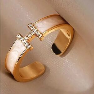 Anthropologie Gold and Cream Ring with Crystal Accent